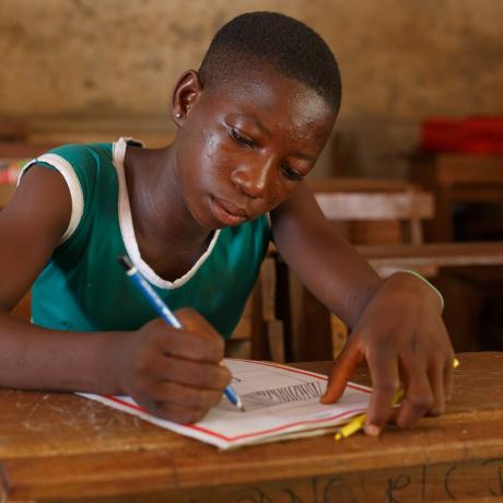 Ophelia 14 draws a building in her classroom.